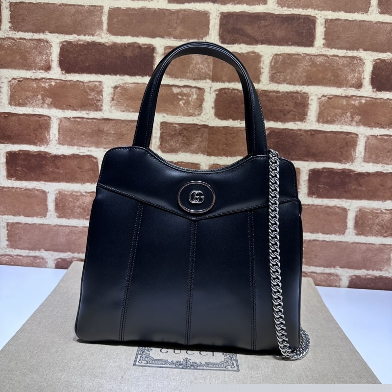 G*u*i top handle bags